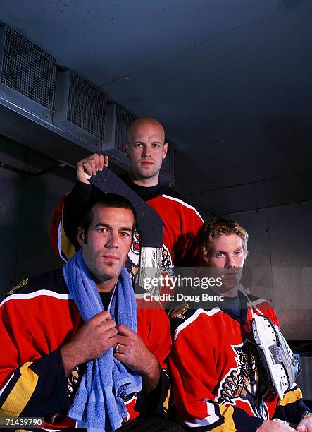 Todd Bertuzzi, Alexander Auld and Bryan Allen of the Florida Panthers pose during a portrait session at Bank Atlantic Center on July 13, 2006 in...