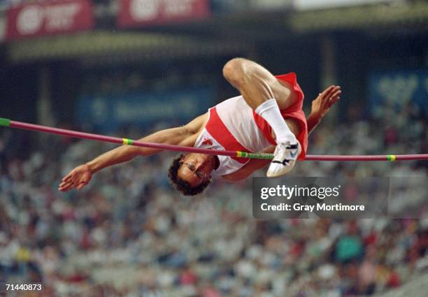 Canadian athlete Arnold Bouldt competing in the high jump event at the 1992 Paralympic Games in Barcelona, September 1992. He won the gold medal.