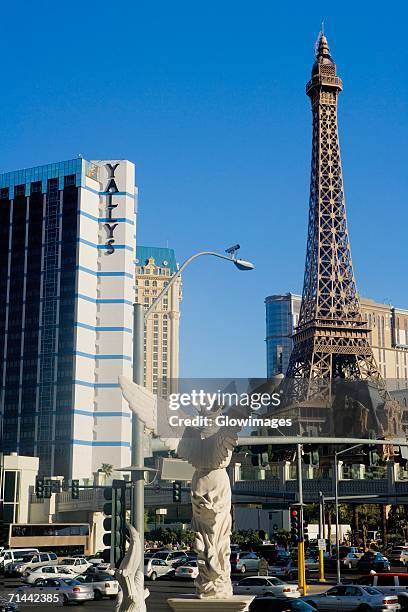 low angle view of a replica of the eiffel tower, las vegas, nevada, usa - las vegas strip exteriors stock pictures, royalty-free photos & images