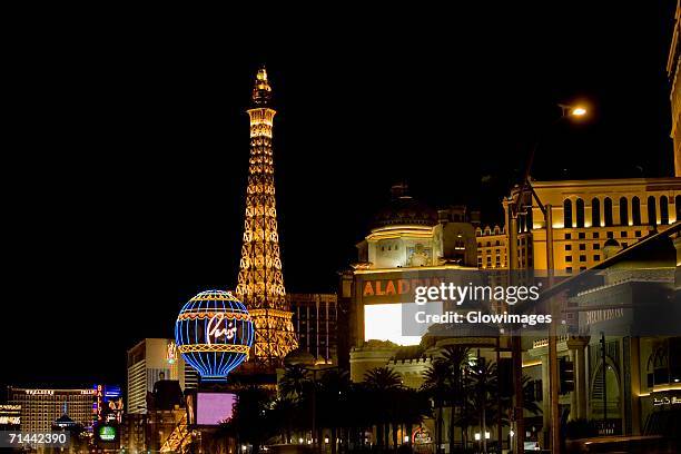 low angle view of a tower lit up at night, las vegas, nevada, usa - パリスラスベガス ストックフォトと画像