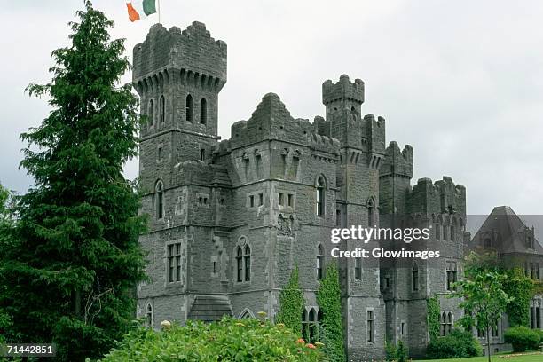 low angle view of a castle, ashford castle, republic of ireland - ashford stock pictures, royalty-free photos & images