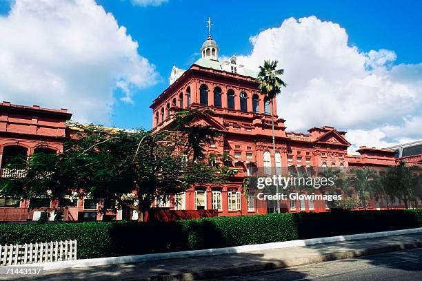 low angle view of the parliament building for tobago, port of spain, trinidad - port of spain stock pictures, royalty-free photos & images