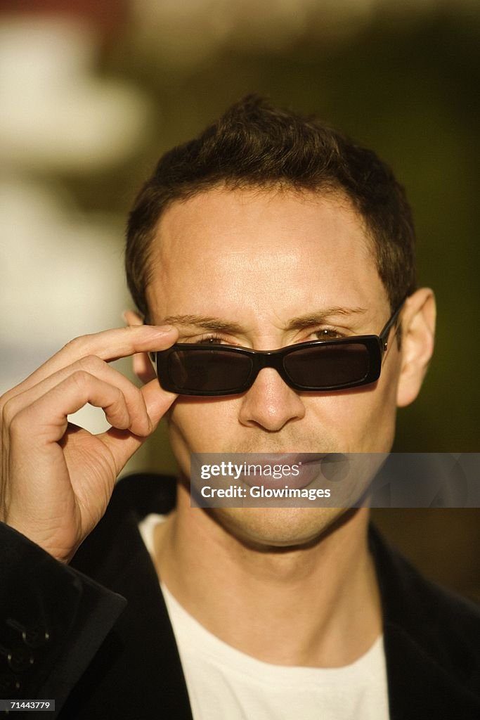 Portrait of a young man wearing sunglasses