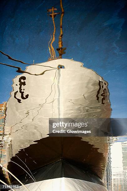 reflection of a cruise ship in the water, inner harbor, baltimore, maryland, usa - ships bow stock pictures, royalty-free photos & images