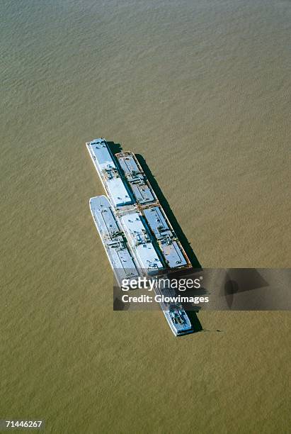 aerial view of grain barges on the river, mississippi river, new orleans, louisiana, usa - louisiana boat stock pictures, royalty-free photos & images