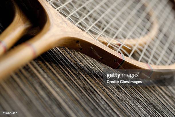 close-up of two tennis rackets - tennis raquet close up photos et images de collection