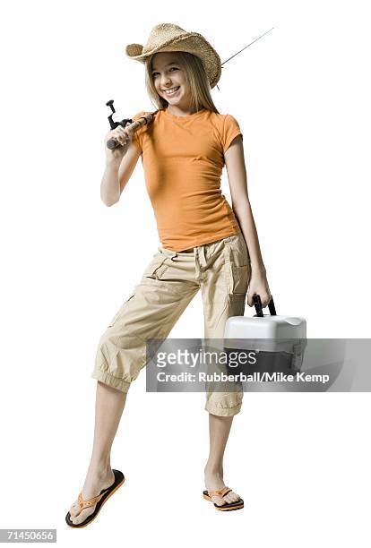 portrait of a girl holding a fishing rod - fishing tackle box stockfoto's en -beelden