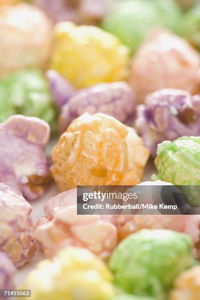 close-up of colorful caramel corn - popcorn full frame stock pictures, royalty-free photos & images