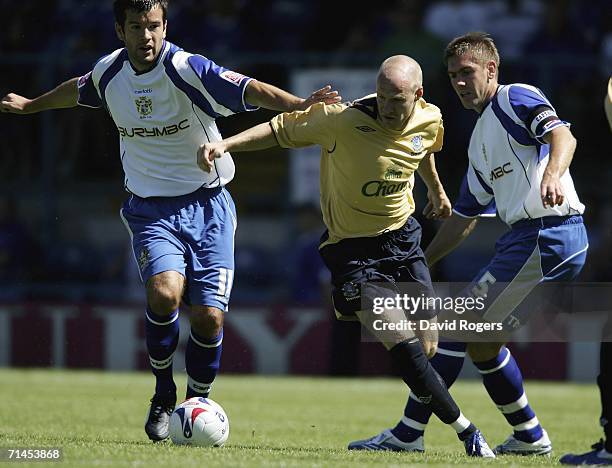 Andy Johnson, on his Everton debut, is stopped by Bury's Brian Barry-Murphy and Dave Challinor during the pre-season friendly match between Bury and...