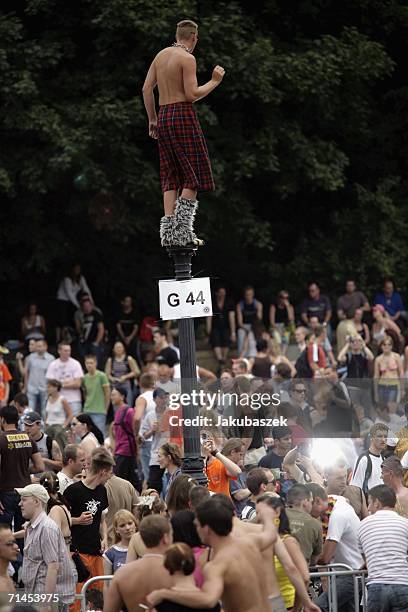 Participants attend at the "Loveparade" on July 15 in Berlin, Germany. Over 300 DJs on 39 trucks, so called "floats" turn the street "Strasse des 17....