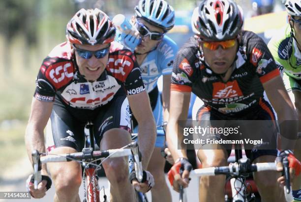 Jens Voigt of Germany and CSC and Oscar Pereiro Sio of Spain and Caisse D'Epargne in action during Stage 13 of the 93rd Tour de France between...