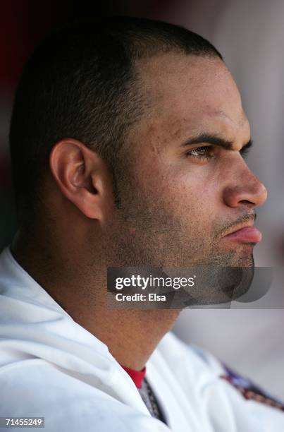 Albert Pujols of the St. Louis Cardinals sits in the dugout after his at-bat against the Los Angeles Dodgers on July 15, 2006 at Busch Stadium in St....