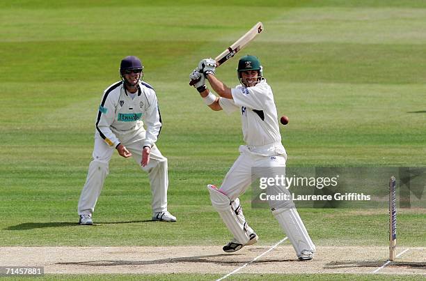 Stephen Flemming of Nottinghamshire smashes the ball to the boundary during the Liverpool Victoria County Championship match between Nottinghamshire...