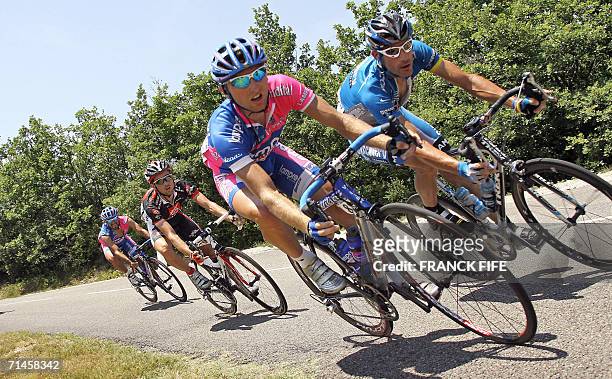 S George Hincapie , Italy's Damiano Cunego , Spain's David Arroyo Duran and Italy's Salvatore Commesso rides during their breakaway in the 180.5 km...