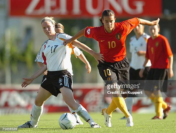 Friederike Engel of Germany and Nathalie Junius of Belgium vie for the ball during the Women's U19 European Championship Final Round match between...