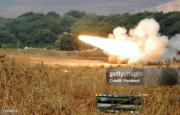 Rocket fired by a Multiple Launch Rocket System is launched against an Hezbollah target in South Lebanon July 16, 2006 from a forward base on the...