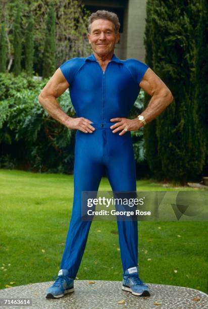 Fitness guru Jack LaLanne shows off his muscles during a 1986 Beverly Hills, California, photo portrait session. From 1951 to 1984, LaLanne hosted a...