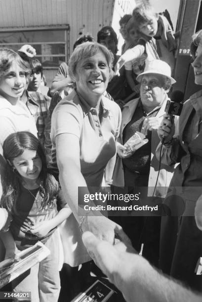 American congresswoman and governor of Connecticut Ella Grass shakes hands with photographer Bernard Gotfryd, Connecticut, 1970s. Grasso was the...