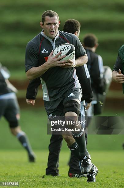All Black loose forward kicks the ball during training at Rugby League Park July 18, 2006 in Wellington, New Zealand. New Zealand play South Africa...
