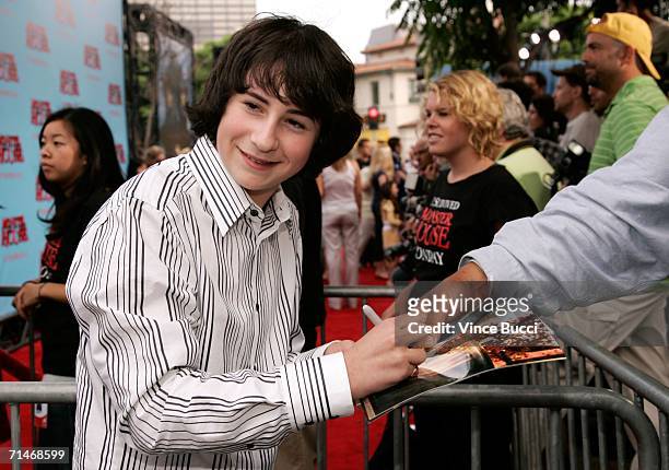 Actor Sam Lerner signs autographs as he arrives at Sony Pictures premiere of "Monster House" held at Mann's Village Theatre on July 17, 2006 in...