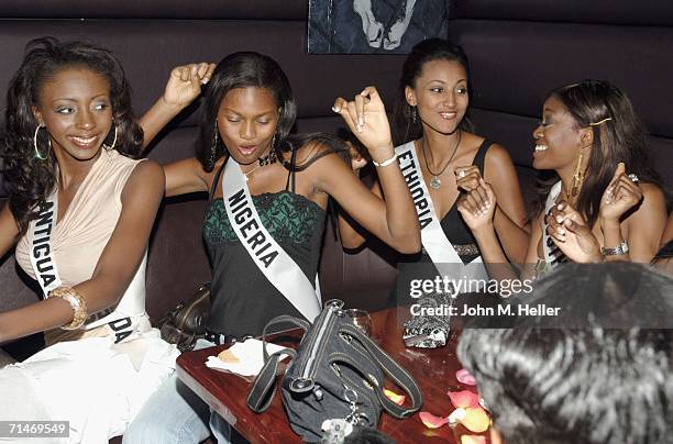 Miss Antigua & Barbuda, Renata Langmannova, Miss Nigeria, Gisella Hilliman, Miss Ethiopia, Dina Fekadu and Miss South Africa, Thuli Sithole, four of...