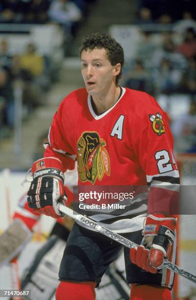 Canadian professional ice hockey player Doug Wilson of the Chicago Blackhawks skates on the ice during a road game against the New York Islanders,...