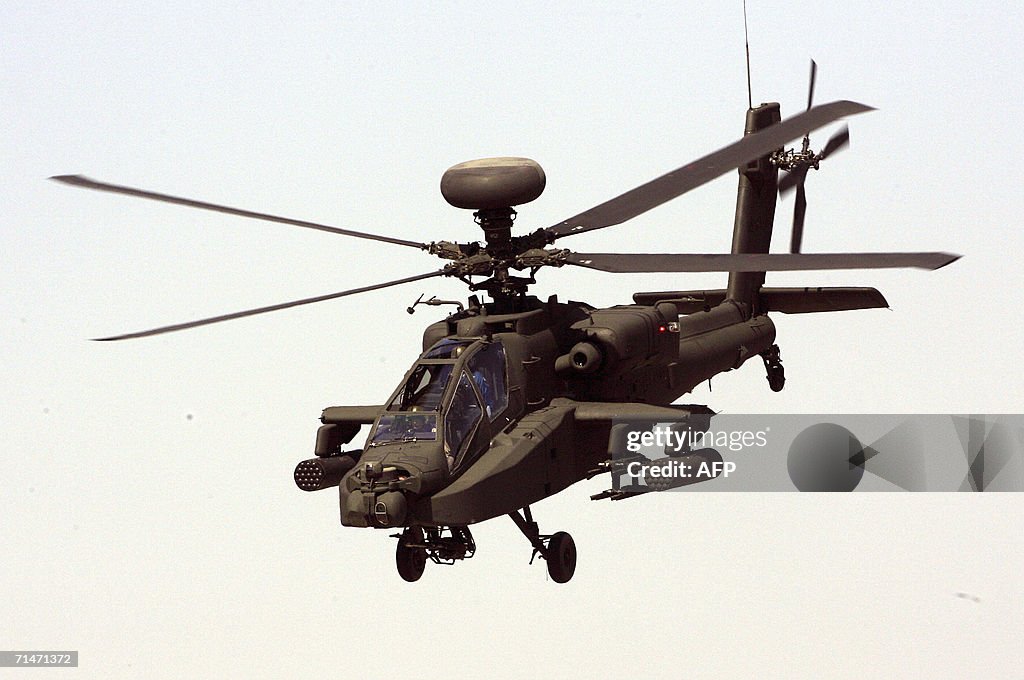 The Boeing AH-64D Apache helicopter take