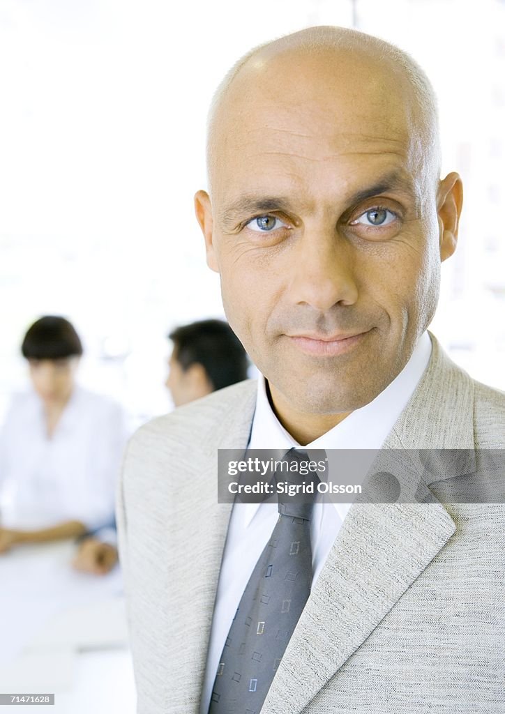 Businessman, looking at camera, portrait