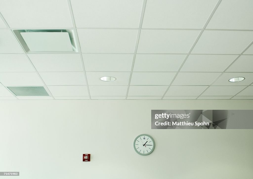 Clock on wall in office space