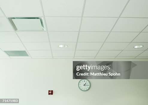 Clock on wall in office space Clock on wall in office space