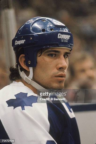 Rick Vaive of the Toronto Maple Leafs sits in the penalty box during an NHL game against the New York Islanders on December 7, 1982 at the Nassau...