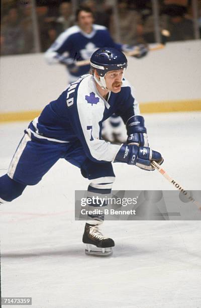 Canadian professional ice hockey player Lanny McDonald of the Toronto Maple Leafs skates on the ice during a game against the New York Rangers,...