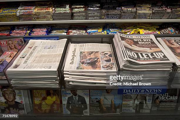 The New York Times and other newspapers are displayed at a newsstand in the Times Square subway station July 18, 2006 in New York City. In a...