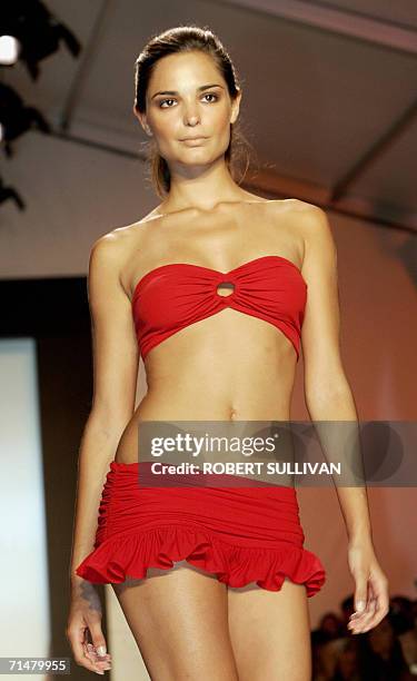 Model wears a design by Norma Kamali 18 July 2006, during theMiami Swim Shows on Miami Beach, FL. AFP PHOTO/Robert SULLIVAN