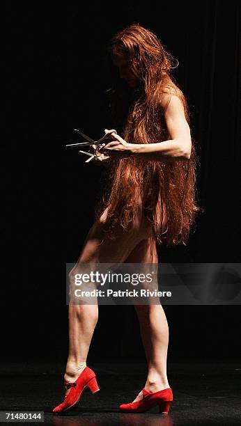 Dancer Sarah-Jayne Howard performs during the Black Milk Photo Call at the Drama Theatre in the Sydney Opera House July 19, 2006 in Sydney, Australia.