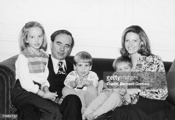 Australian-born American media billionaire Rupert Murdoch sits with his second wife and their three children, Elisabeth , Lachlan , and James , on a...