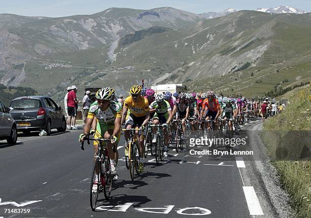 Race leader and yellow jersey holder Floyd Landis of the USA and Phonak climbs the Col du Galibier during Stage 16 of the 93rd Tour de France between...