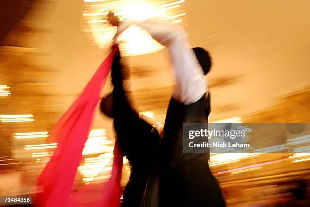 Richard Lamberty and Stuart Nichols practice during the Dancesport Competition of the Gay Games VII at the Hilton Hotel on July 19, 2006 in Chicago,...