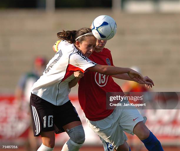 Nadine Kessler of Germany and Ksenia Tsybutovich competes of Russia during the Women's U19 European Championship Semi Final between Germany and...