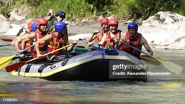 Players of the Hamburg SV takes part in a white-water rafting tour on the Saalbach River on July 20, 2006 in Lofers near Salzburg, Germany. The...