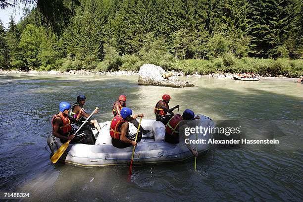 Players of the Hamburg SV takes part in a white-water rafting tour on the Saalbach River on July 20, 2006 in Lofers near Salzburg, Germany. The...