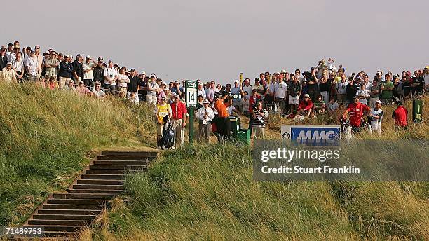 Tiger Woods of USA tees off on the 14th hole during the first round of The Open Championship at Royal Liverpool Golf Club on July 20, 2006 in...