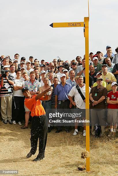 Tiger Woods of USA hits his second shot on the 11th hole during the first round of The Open Championship at Royal Liverpool Golf Club on July 20,...