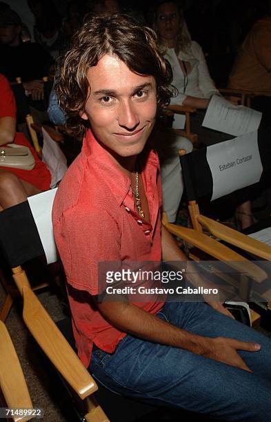 Designer Esteban Cortazar watches the show in the front row Norma Kamali Summer 2007 fashion show during the Sunglass Hut Swim Shows Miami in the...