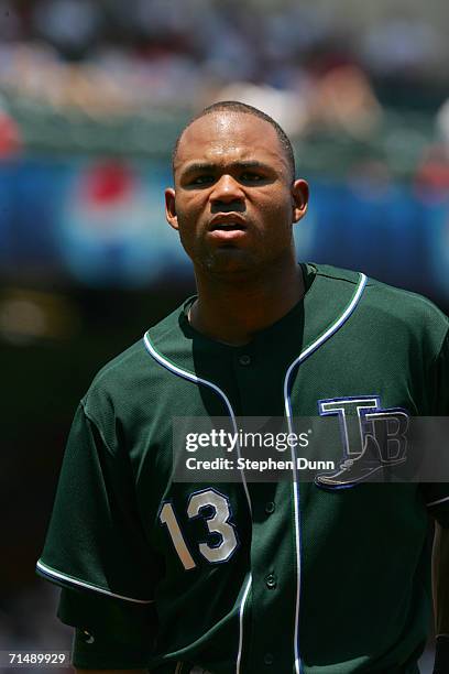 Outfielder Carl Crawford of the Tampa Bay Devil Rays watches the game against the Los Angeles Angels of Anaheim on June 16, 2006 at Angel Stadium in...