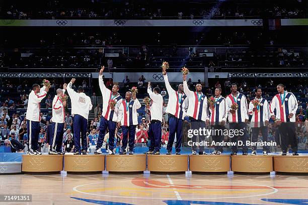 The United States National Team celebrate winning their Gold Medals at the 2000 Summer Olympics Medal Ceremony in Sydney, Australia. NOTE TO USER:...