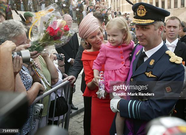 Princess Mathilde, Princess Elisabeth and Prince Philippe greeting the crowd after leaving the Saint Michael and Saint Gudula Cathedral where they...