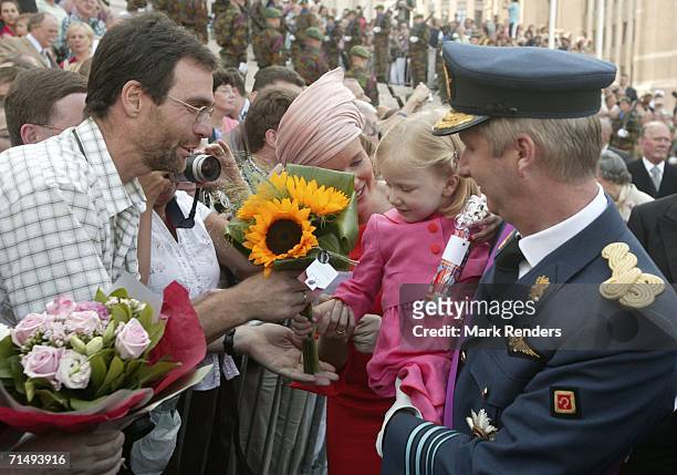 Princess Mathilde, Princess Elisabeth and Prince Philippe greeting the crowd after leaving the Saint Michael and Saint Gudula Cathedral where they...