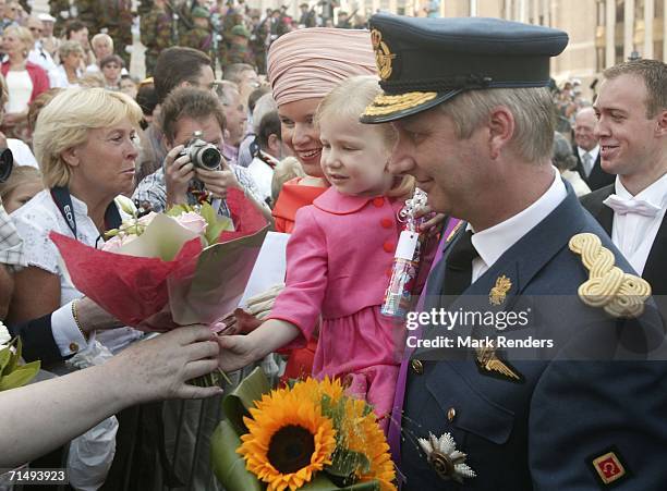 Princess Mathilde, Princess Elisabeth and Prince Philippe greeting the crowd after leaving the Saint Michael and Saint Gudula Cathedral where they...