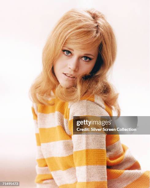 American actress Jane Fonda wearing a yellow and white striped jersey, circa 1965.